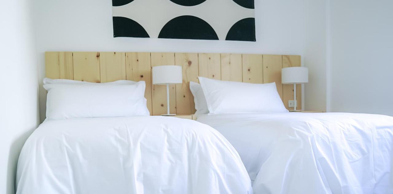 Casagrande Hotel & Beach Club José Ignacio Eksteriør bilde A bed with white sheets