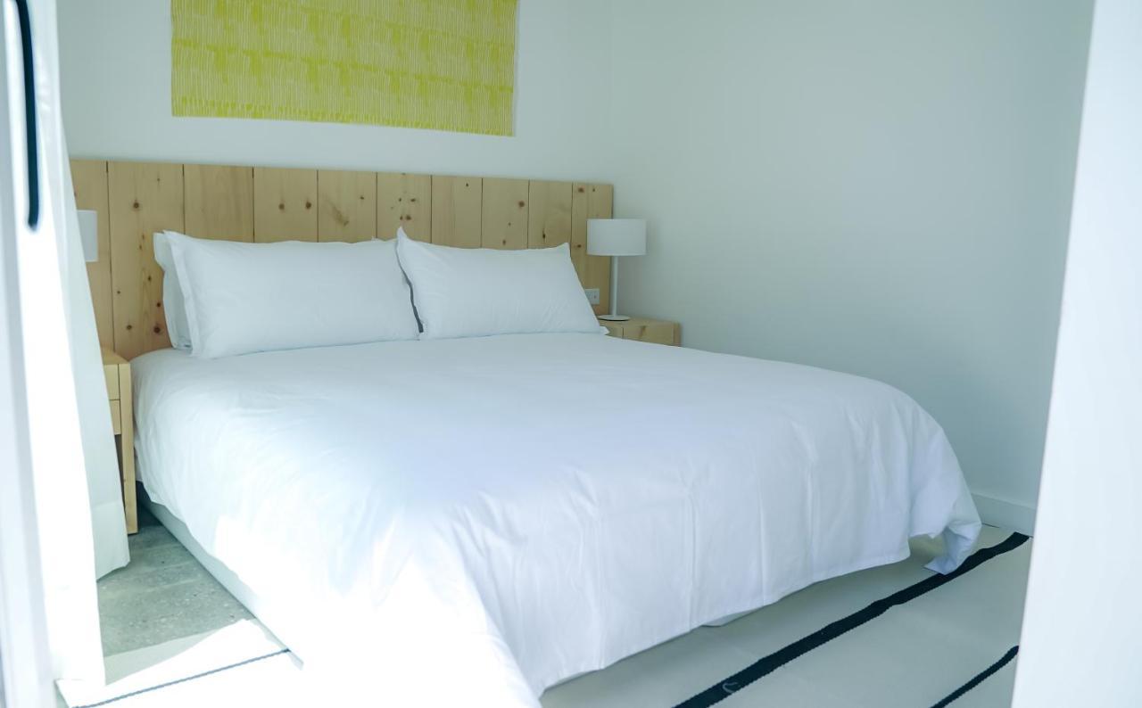 Casagrande Hotel & Beach Club José Ignacio Eksteriør bilde A bed with a duvet