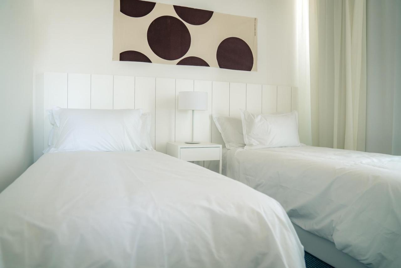Casagrande Hotel & Beach Club José Ignacio Eksteriør bilde A bedroom with two single beds